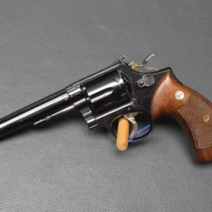 Smith & Wesson Modell 14-3, brüniert, Kaliber 38 S&W, 6″ Lauf, Holzgriff, sehr gut